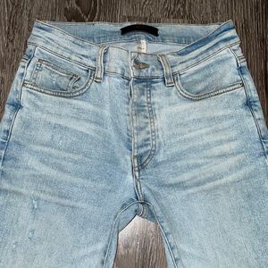AMIRI
ripped distressed skinny jeans